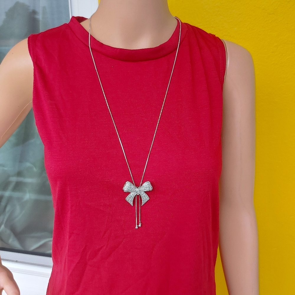 18k white gold plated set, neckace and earrings.